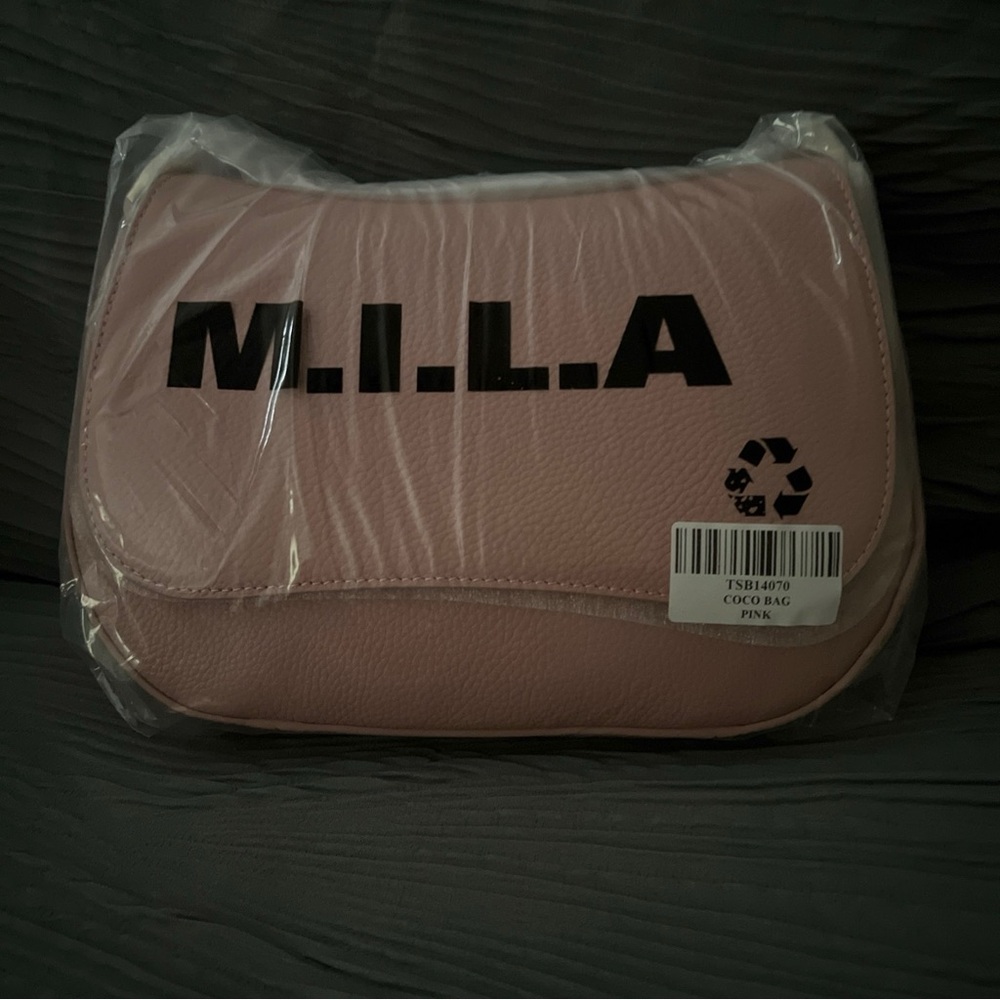 Soft Pink Crossbody Bag with Contemporary Design